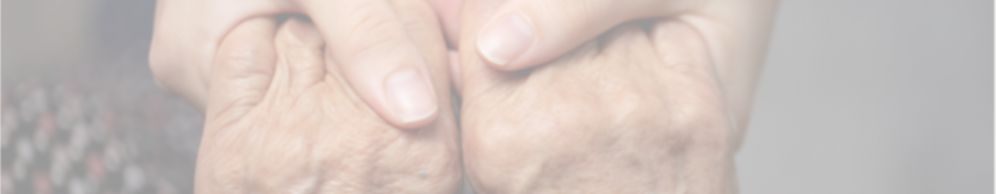 Two people clasping hands