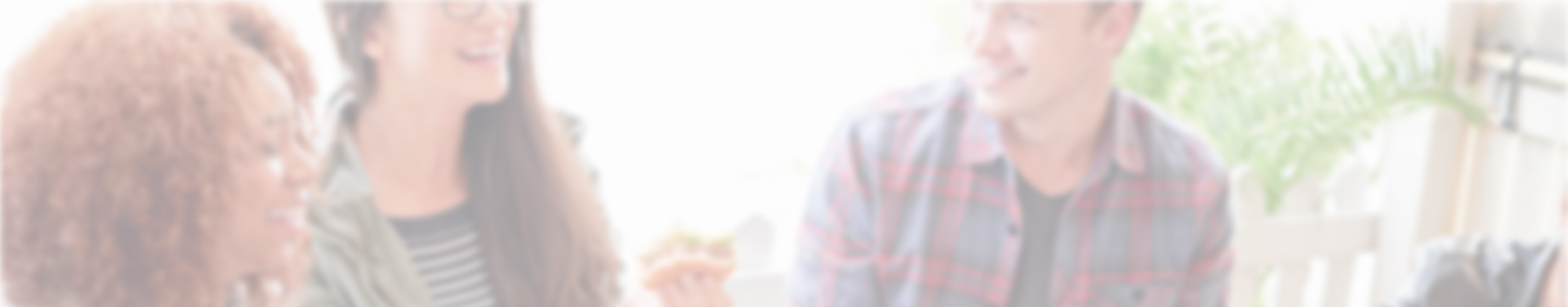 A group of people eating in a circle