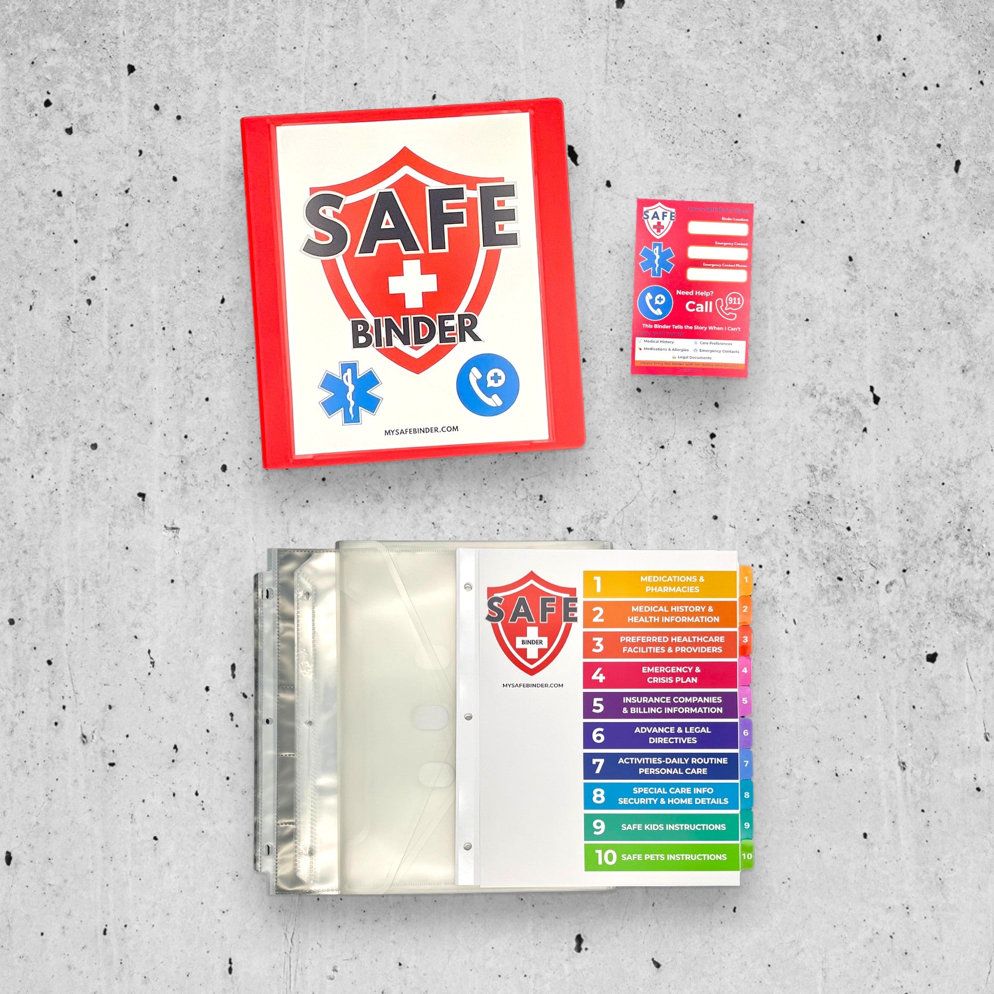 SAFE Binder with colorful labels on a gray concrete surface