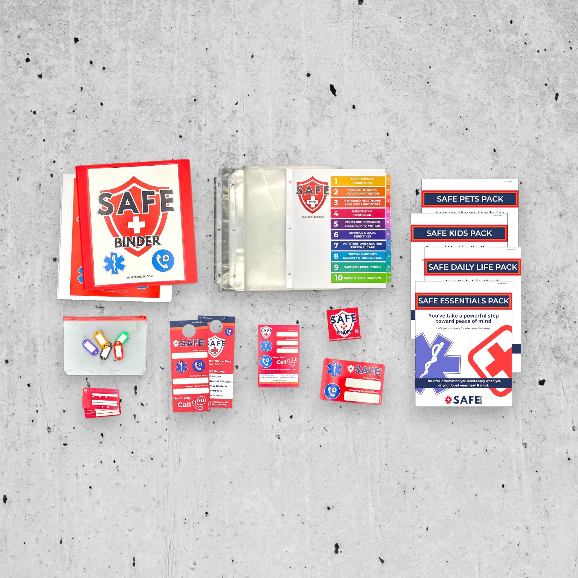SAFE Binder and included materials on a concrete background