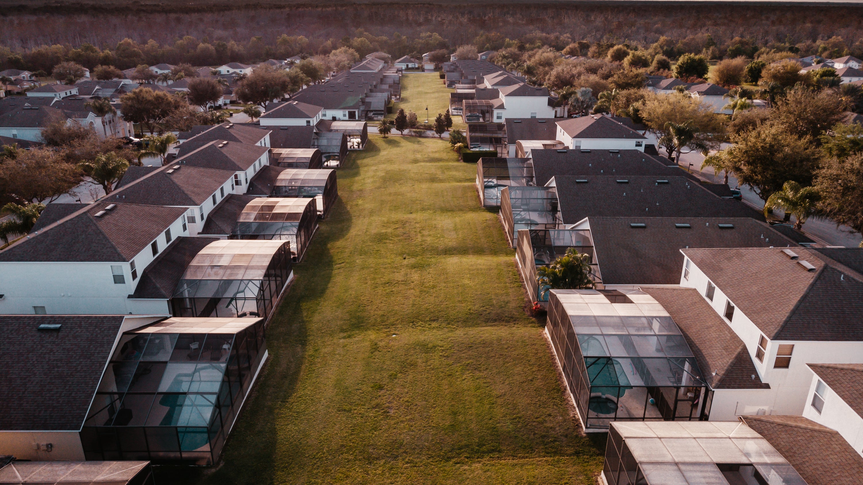 Roofs and pools of Florida residential neighborhood