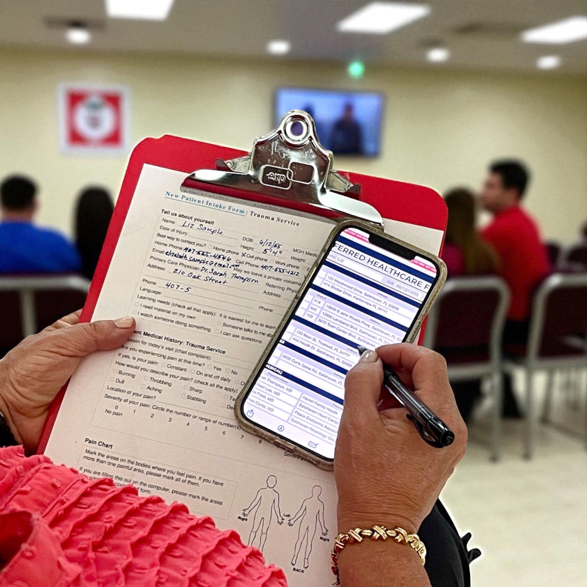 A person completing a patient intake form using digital forms on their phone