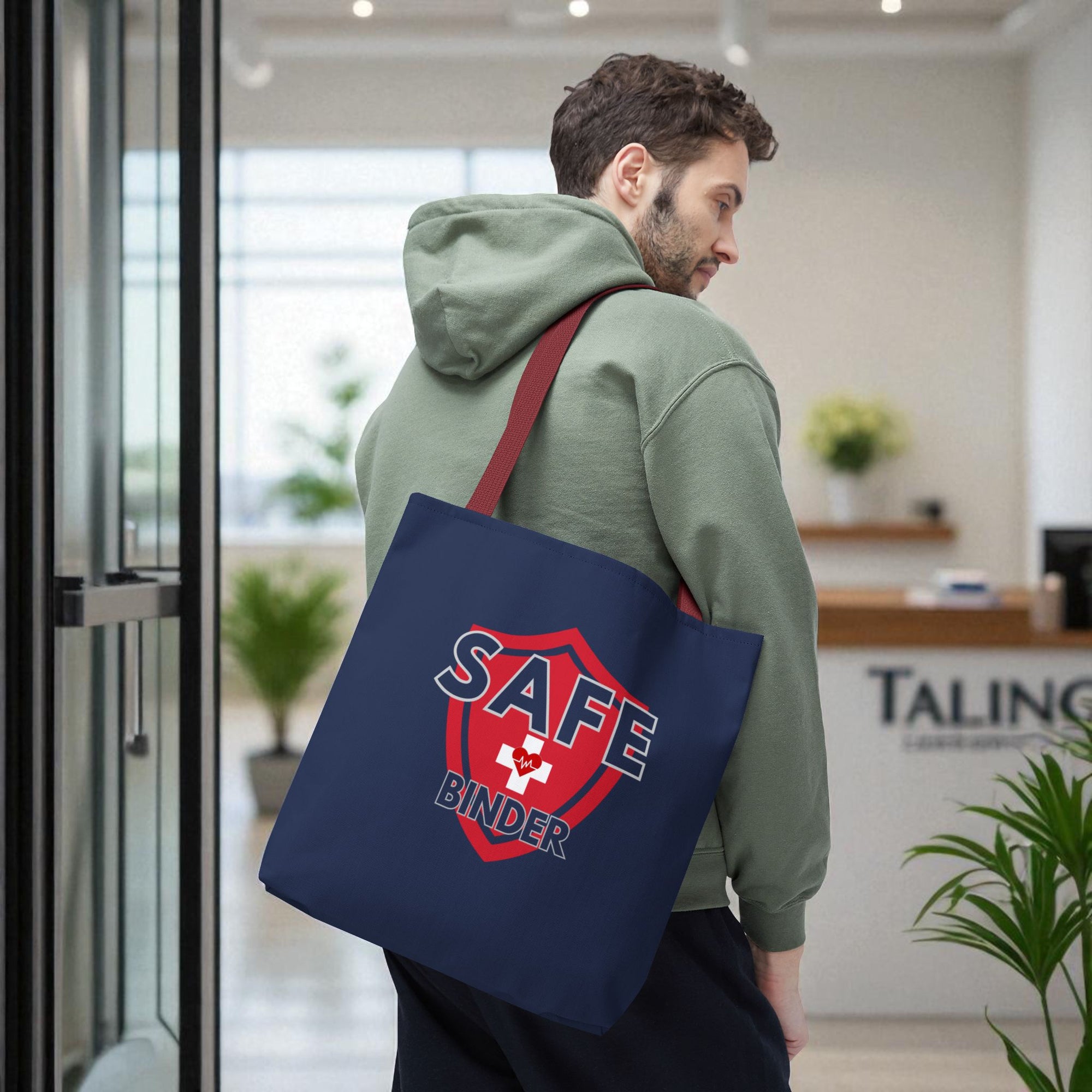 A blue tote bag on a man's shoulder